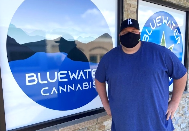 Ryan Graham stands outside of Bluewater Cannabis