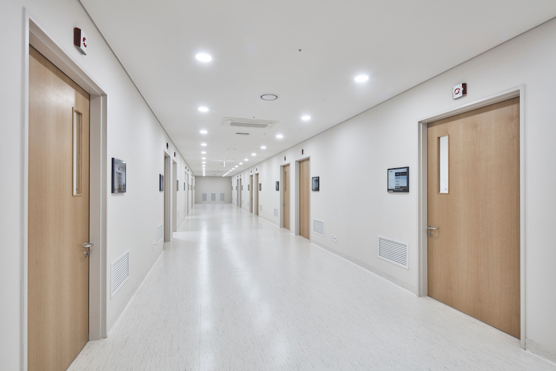 An empty hospital hallway. Medical cannabis patients say the system is failing them.