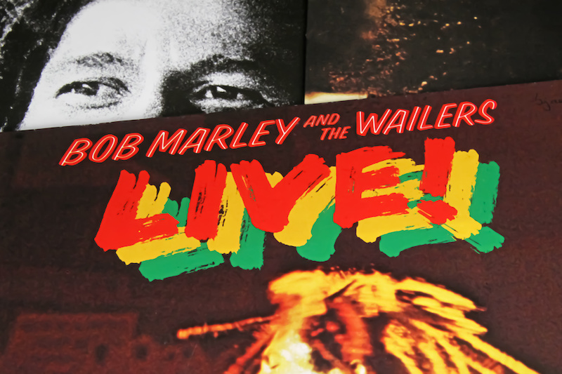 Bob Marley is pictured on music and merchandise.