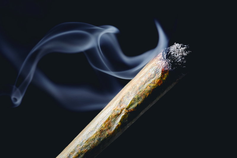 A smoking pre-roll is pictured